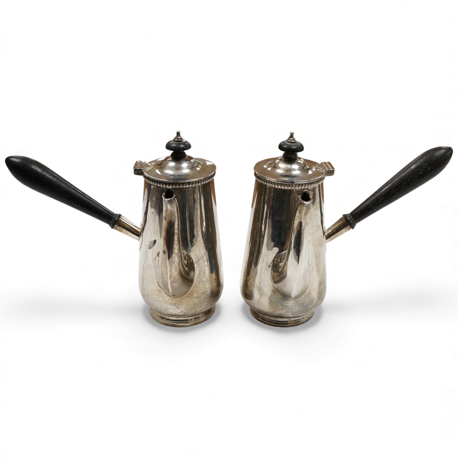 A George V silver café au lait pair, by Goldsmiths & Silversmiths Co Ltd, London, 1922, height 16.5cmm gross weight 20.3oz.
